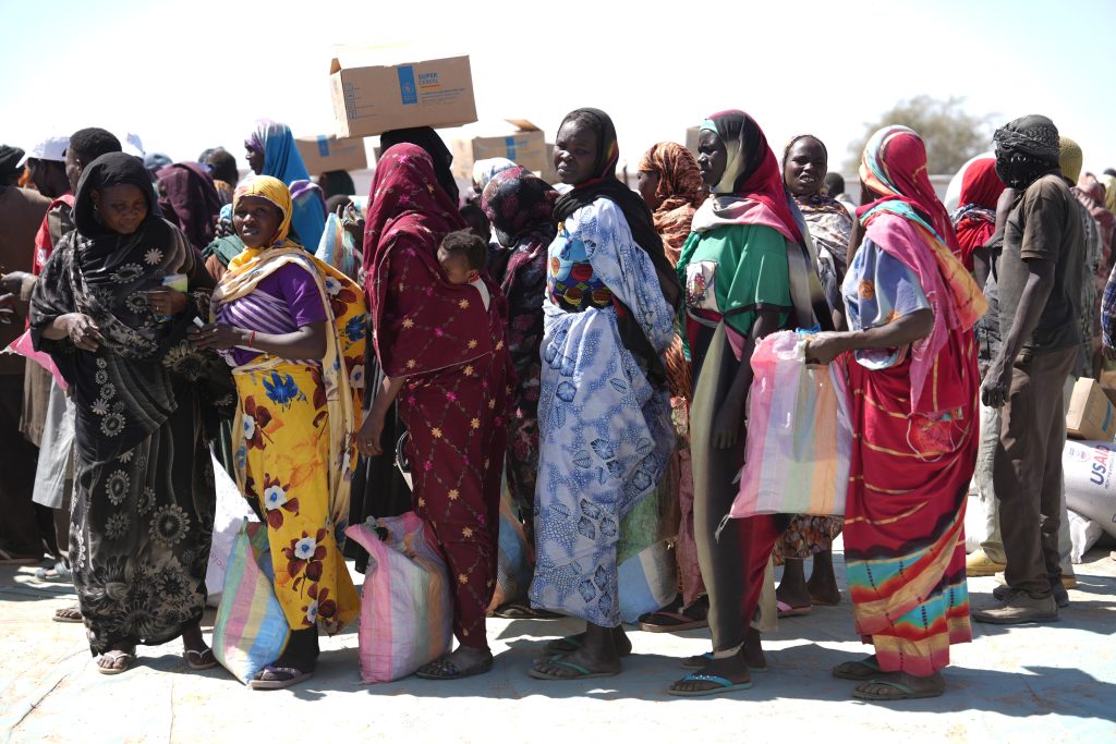 Sudanese refugees register for food aid in Adré, Chad